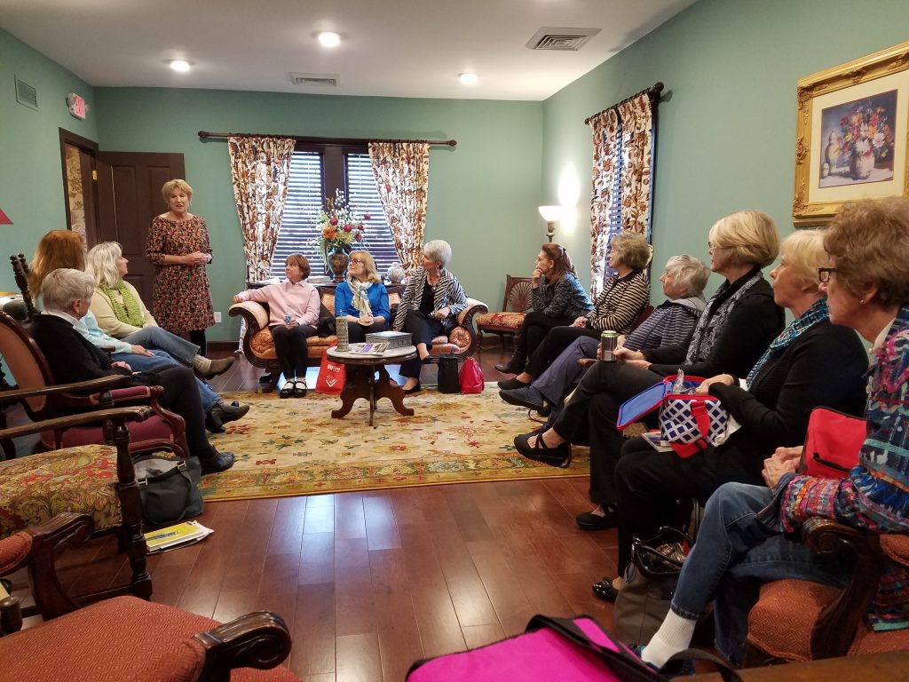 Visitors gathered in the parlor of the Blind Boone Home during a guided tour